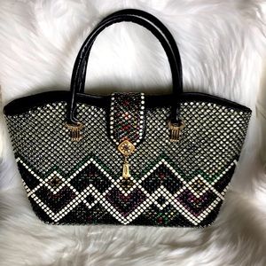 Brand unknown. 16” wide 9” high 4” deep. Zips closed at top